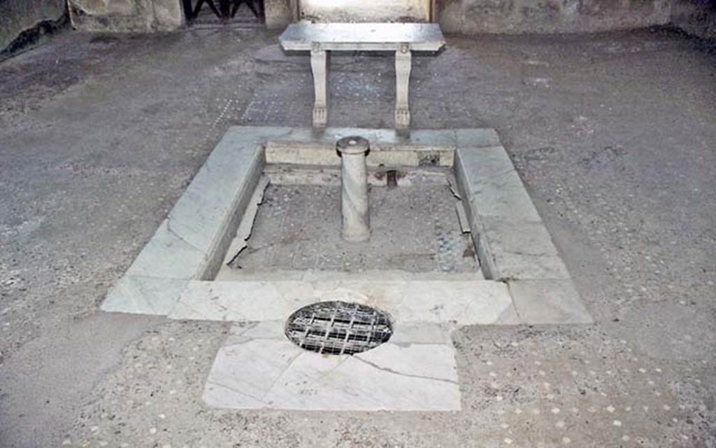 III.11 Herculaneum. October 2001. Room 6, looking east across impluvium in atrium.
Photo courtesy of Peter Woods.